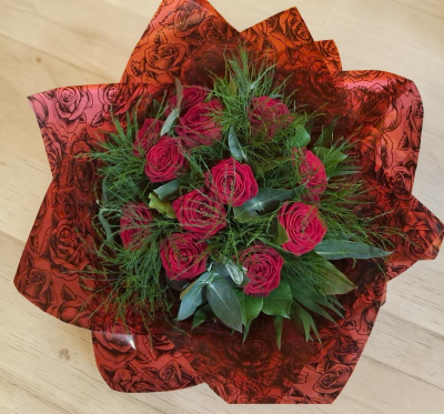 12 Red Roses - 12 Red roses and lush greenery, beautifully wrapped in elegant patterned paper.