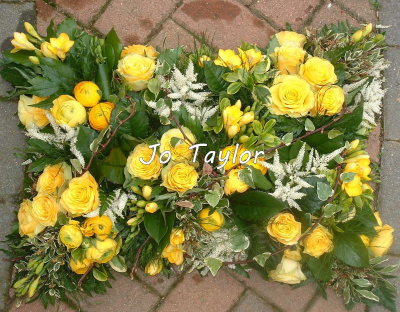 Yellow and White Grouped Pillow - Flowers arranged grouped together.  Flowers used will vary due to seasonal availability.
Available in other colours. Please add colour requirements and specific flower choice to the special requirements box.